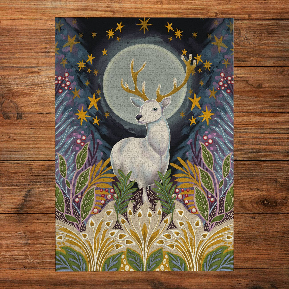 Moonlight Magic Silver Stag jigsaw puzzle by Gibsons, showing a white stag among colourful woodland foliage beneath the moonlight.