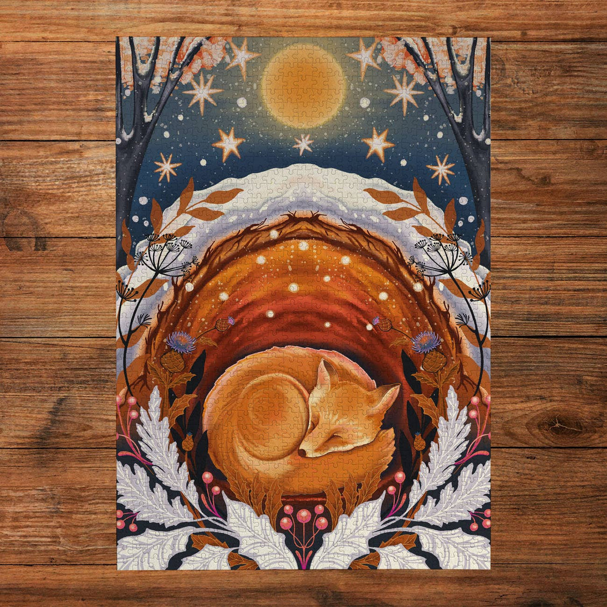 Moonlight Magic Snowy Sanctuary jigsaw puzzle by Gibsons, featuring a sleeping woodland animal nestled beneath a glowing moon.