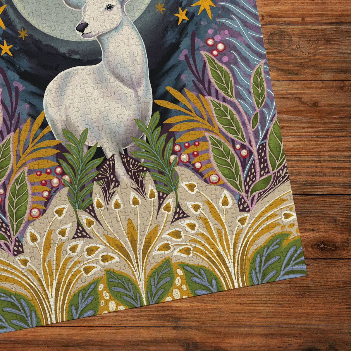 Moonlight Magic Gibsons jigsaw puzzle featuring a close-up of the silver stag illustration surrounded by woodland plants.