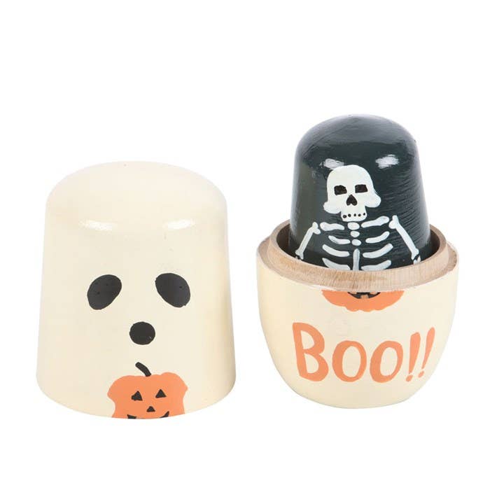 Halloween Russian nesting doll set showing the larger ghost and skeleton dolls opened