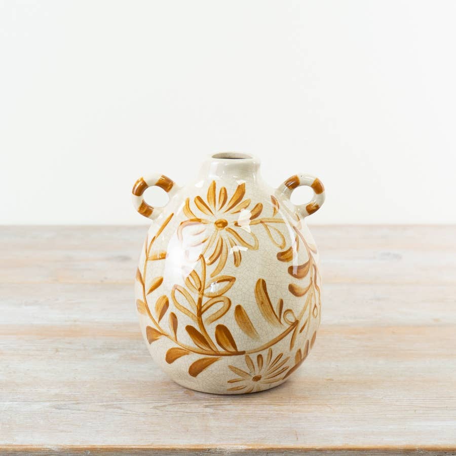 Hand-painted ceramic flower vase with ochre floral design and twin handles