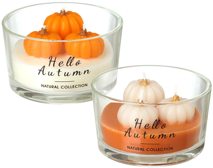 Hello Autumn pumpkin candles in clear glass dishes with orange and cream pumpkin designs