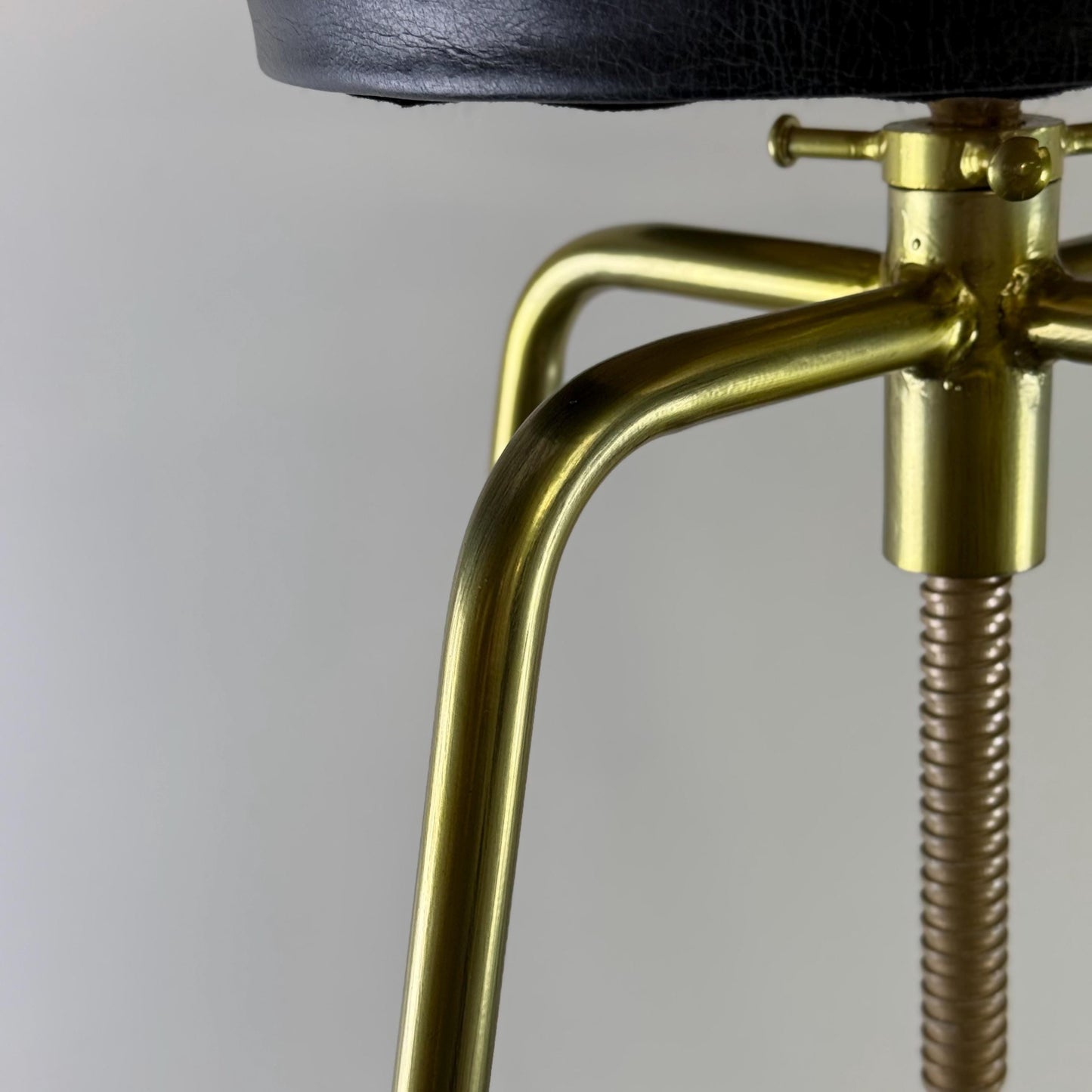 Brass Bar Adjustable Stool Black Leather Top Seat | Vintage Industrial Style by Vintage-Electrical