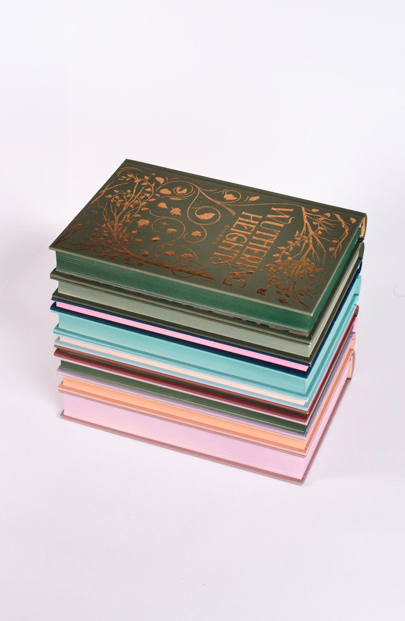 Jane Eyre Wordsworth Luxe Collection hardback displayed on a stack of colourful classic books