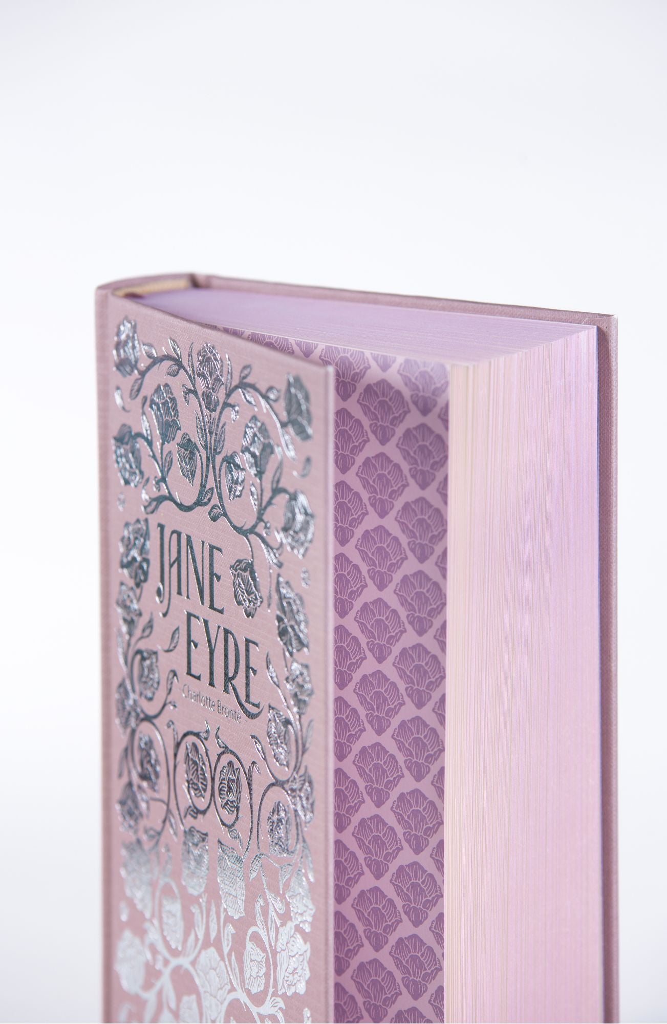 Jane Eyre by Charlotte Brontë, Wordsworth Luxe Collection hardback shown upright with decorative pink cover and spine