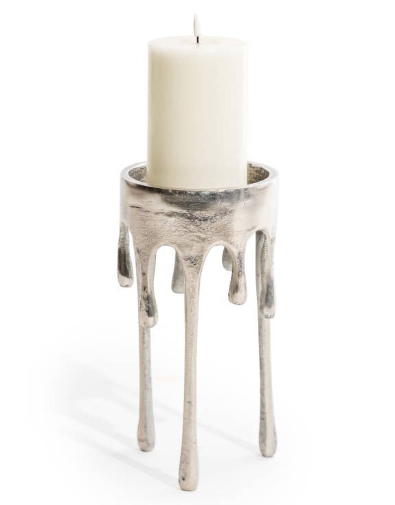 Large Raw Nickel Dali Drip Candle Holder with sculptural silver melting-wax design and cream pillar candle against a white background