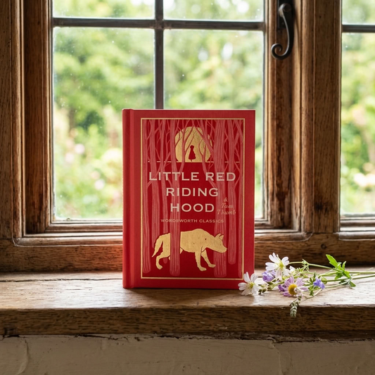 Little Red Riding Hood Wordsworth Pocket Fairytales hardback on a cottage windowsill with woodland flowers