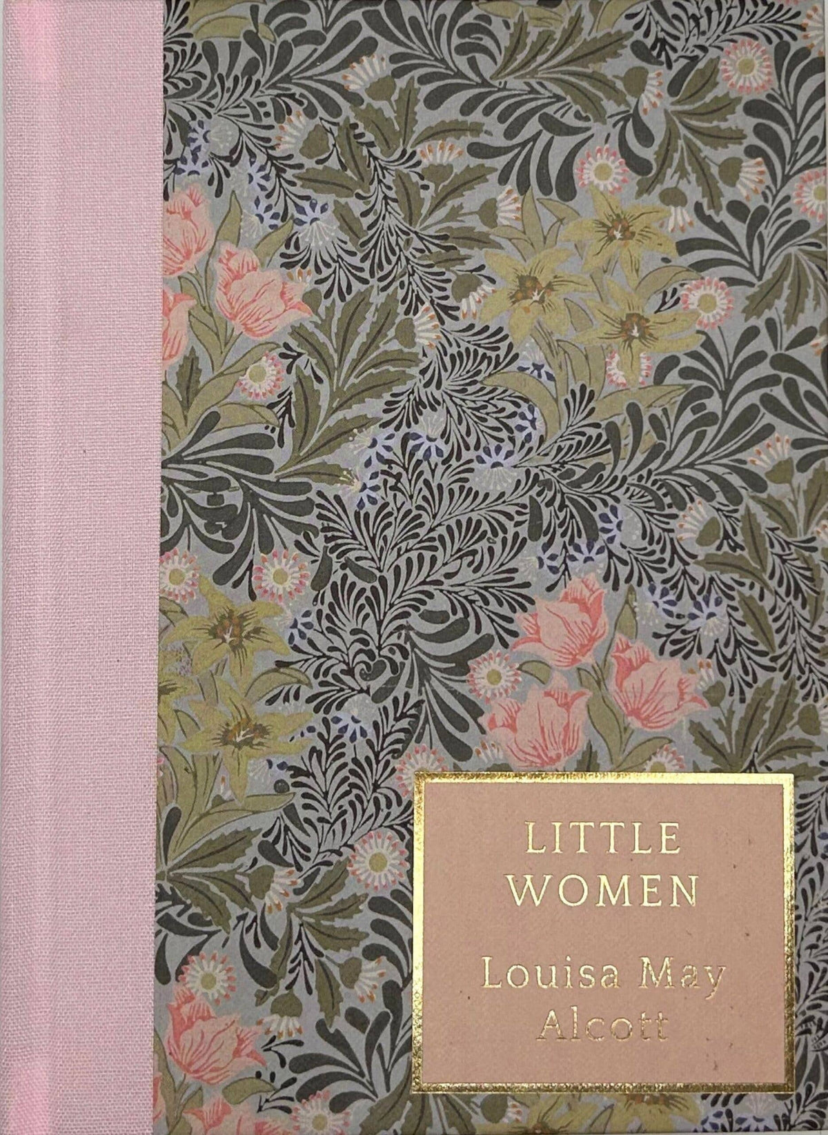 Little Women by Louisa May Alcott Heritage Collection hardback showing its decorative floral cover and pink linen spine