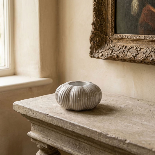 Neutral Pumpkin Tealight Holder styled on an aged stone ledge in a traditional country home
