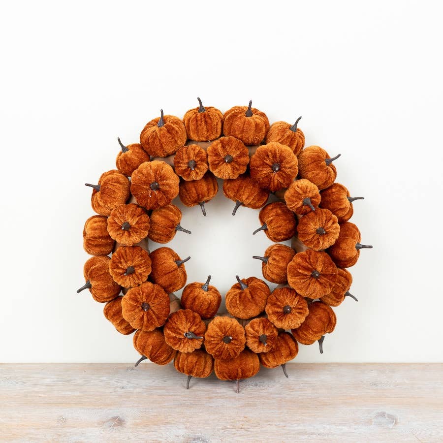 Orange velvet pumpkin wreath with layered plush pumpkins in warm autumn tones, 38cm