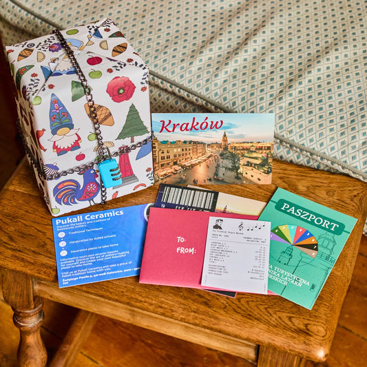 Padlock'd Poland escape room gift game with puzzle pieces, wrapping paper, chain and padlock