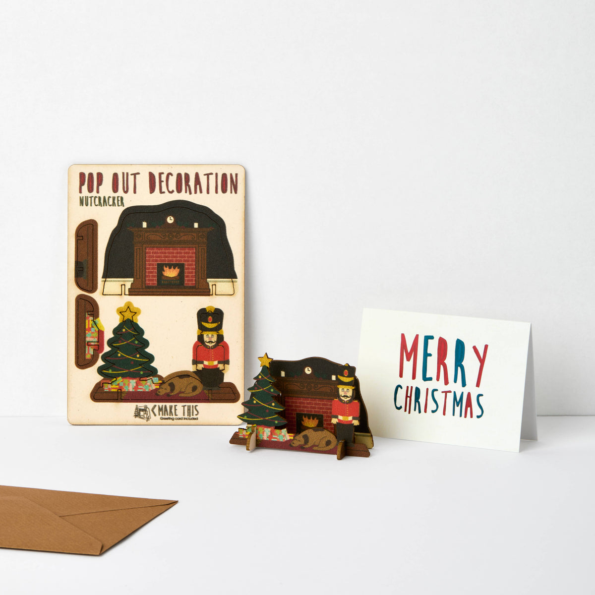 Pop Out Nutcracker Christmas Card showing the flat pop-out sheet, assembled decoration and Merry Christmas message card