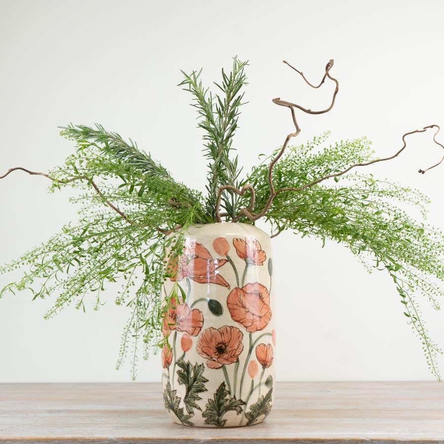 Poppy Vase 30.5cm styled with natural greenery, showing its colourful red poppy design and glazed finish in a rustic country home setting.