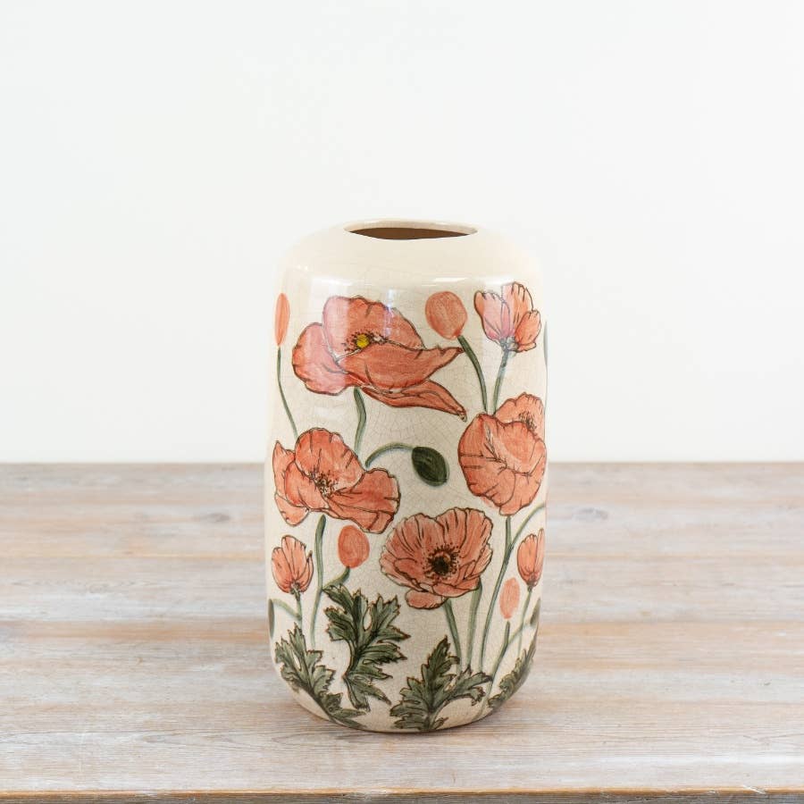 Poppy Vase 30.5cm with decorative red poppy flowers, green botanical detailing and a softly glazed cream background, displayed on a wooden surface.