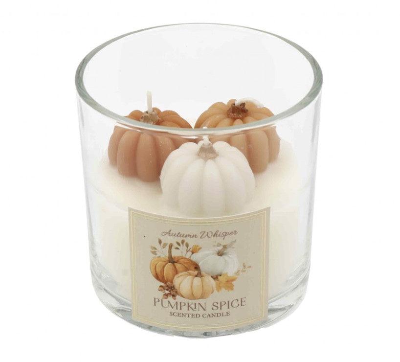 Pumpkin spice scented candle in clear glass pot with decorative pumpkin-shaped wax details