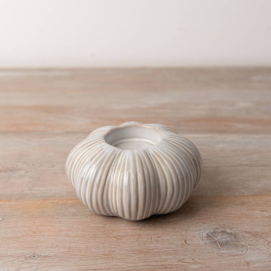 Pumpkin Tealight Holder in neutral reactive glazed ceramic with fine ribbed detailing