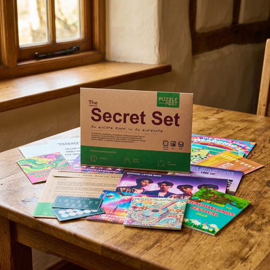 Puzzle Post The Secret Set escape room game with puzzle contents displayed on a traditional wooden table