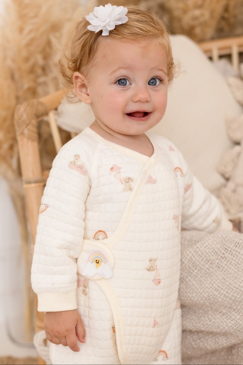 Rainbow Bouclé Baby Grow Romper showing the kimono-style wrap front