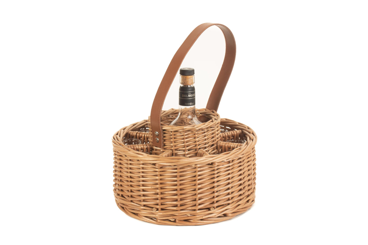 Round willow whisky carrier viewed from the front, showing its natural willow weave and tall leather handle