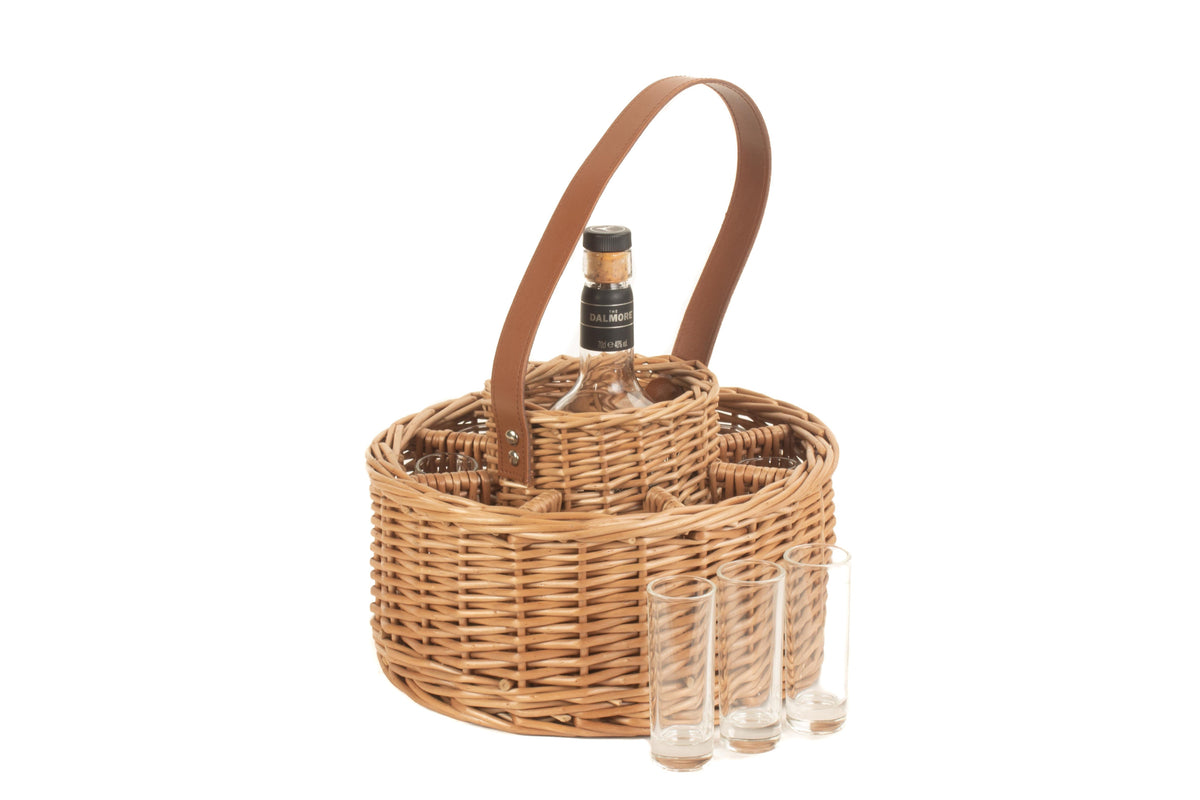 Round willow whisky celebration carrier showing its circular basket shape, central bottle holder and leather carry handle
