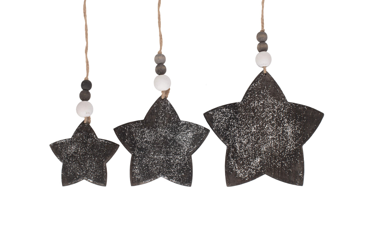 Set of three rustic glitter wooden star Christmas decorations in graduating sizes with decorative wooden beads and natural jute hanging loops
