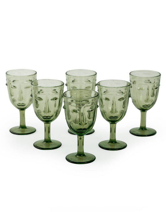 Set of 6 Green Deco Face Wine Glasses showing their soft green colouring, sculpted facial detailing and elegant stemmed design