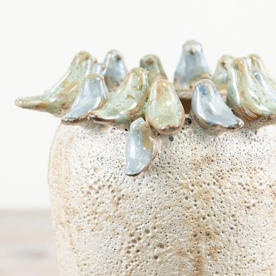 Stone Bird Vase 22cm close-up showing the delicate blue-green glazed birds perched around the textured rustic vase rim.