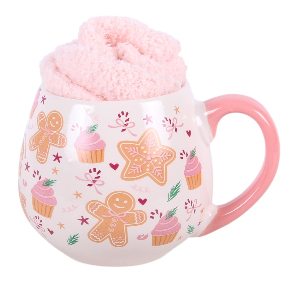 Sugarplum Bakery Christmas Mug and Fluffy Socks Gift Set showing pink fluffy socks inside a gingerbread print mug