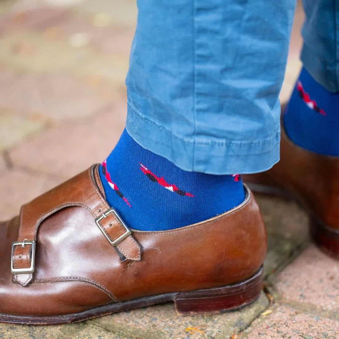 Blue Swole Panda car design bamboo socks styled with brown shoes