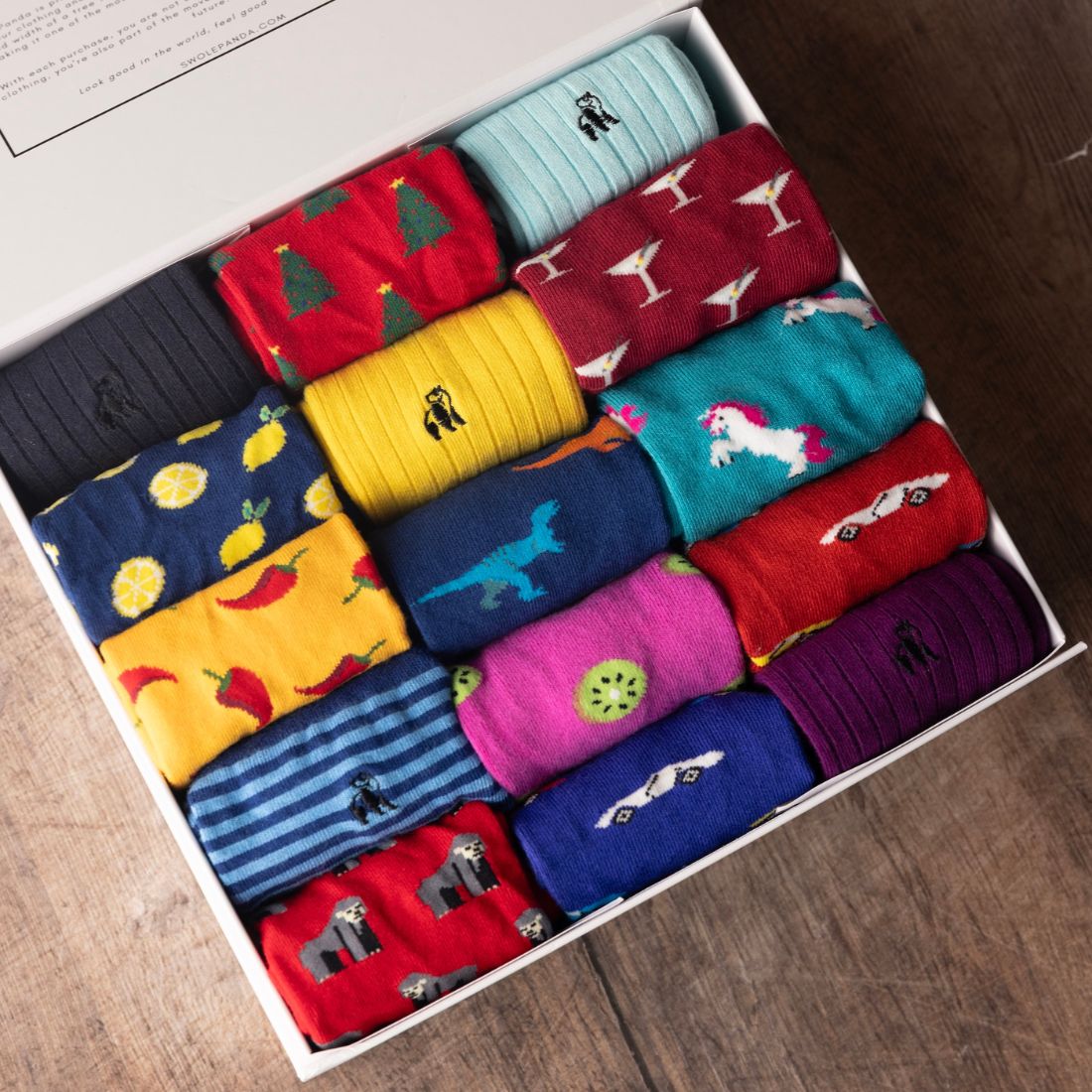 Open Swole Panda gift box filled with assorted colourful patterned bamboo socks