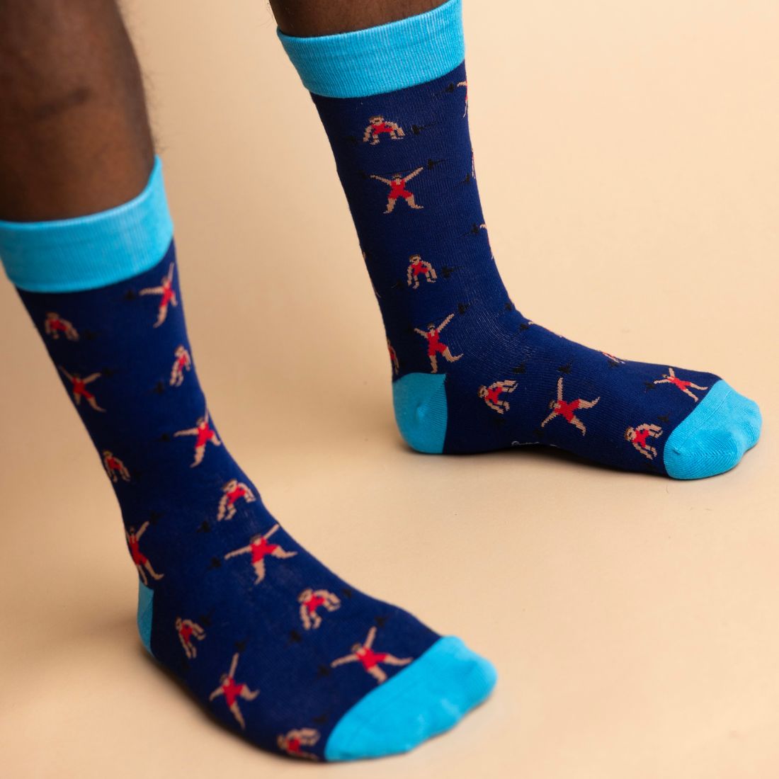 Navy Swole Panda bamboo socks with bright blue heel and toe and colourful patterned details