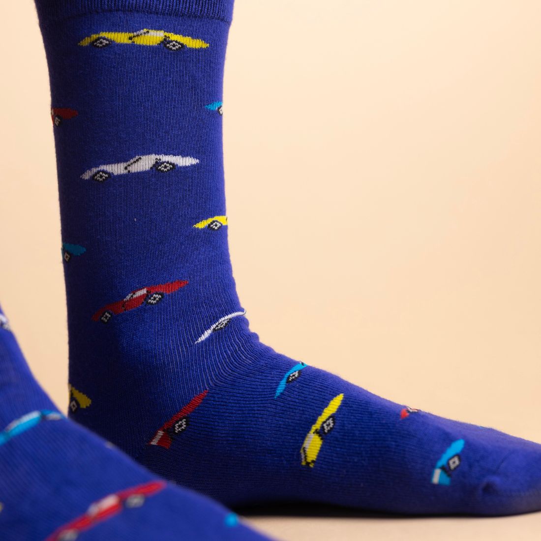 Navy Swole Panda bamboo socks with colourful patterned details and contrasting heel and toe