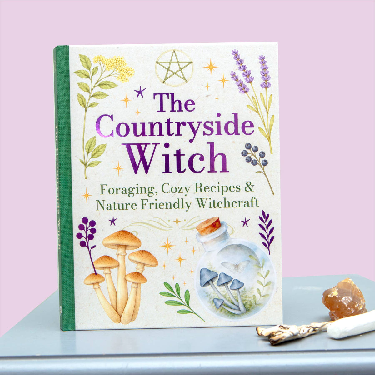 The Countryside Witch hardback book featuring foraging, cosy recipes and nature-friendly witchcraft