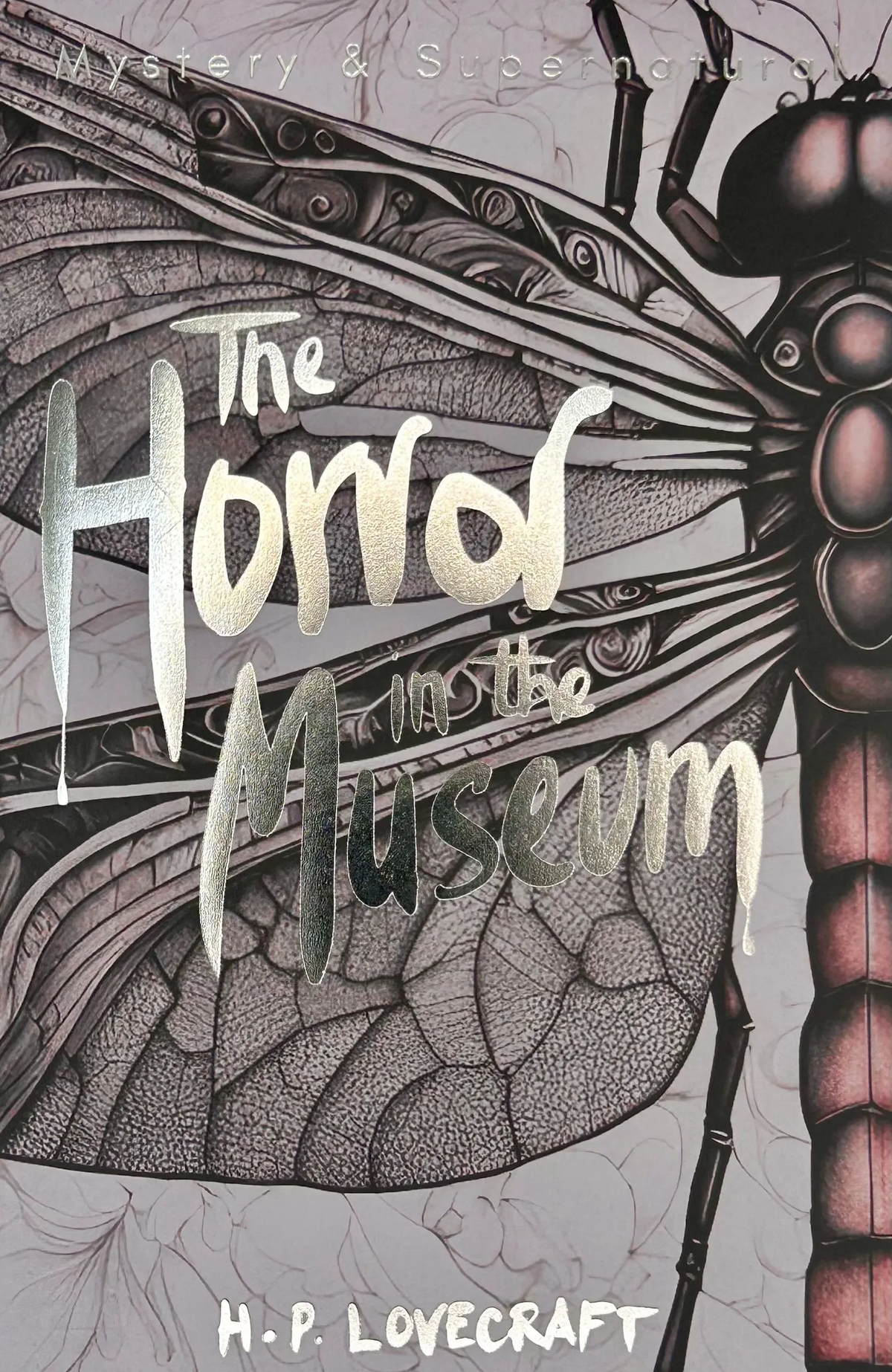 The Horror in the Museum by H. P. Lovecraft paperback front cover featuring a large dark insect illustration and silver lettering