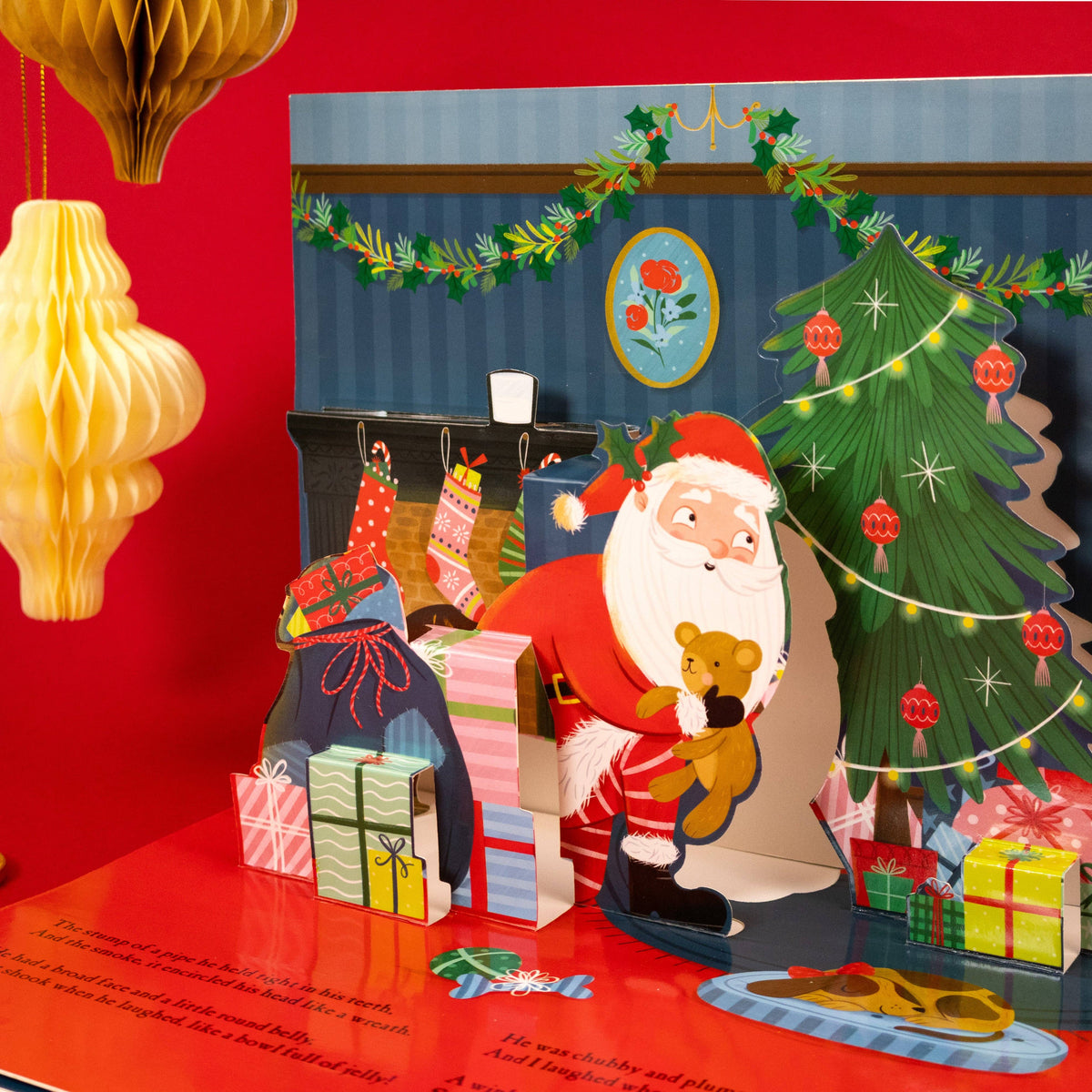 The Night Before Christmas children's book opened to display a colourful festive pop-up scene