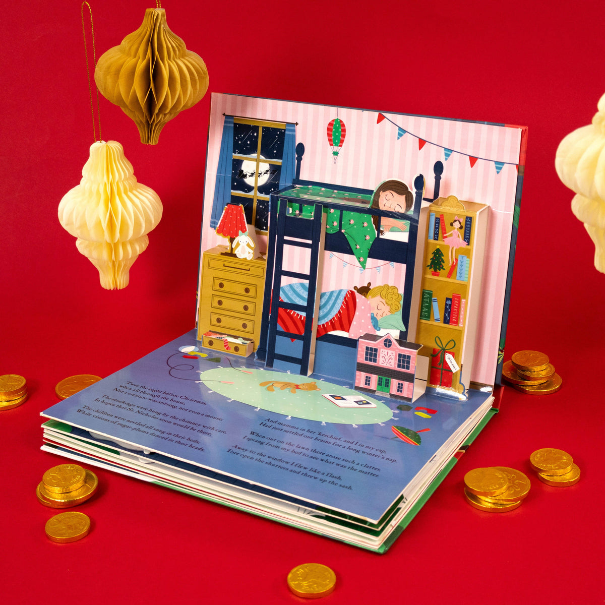 The Night Before Christmas pop-up book showing an illustrated Christmas interior scene