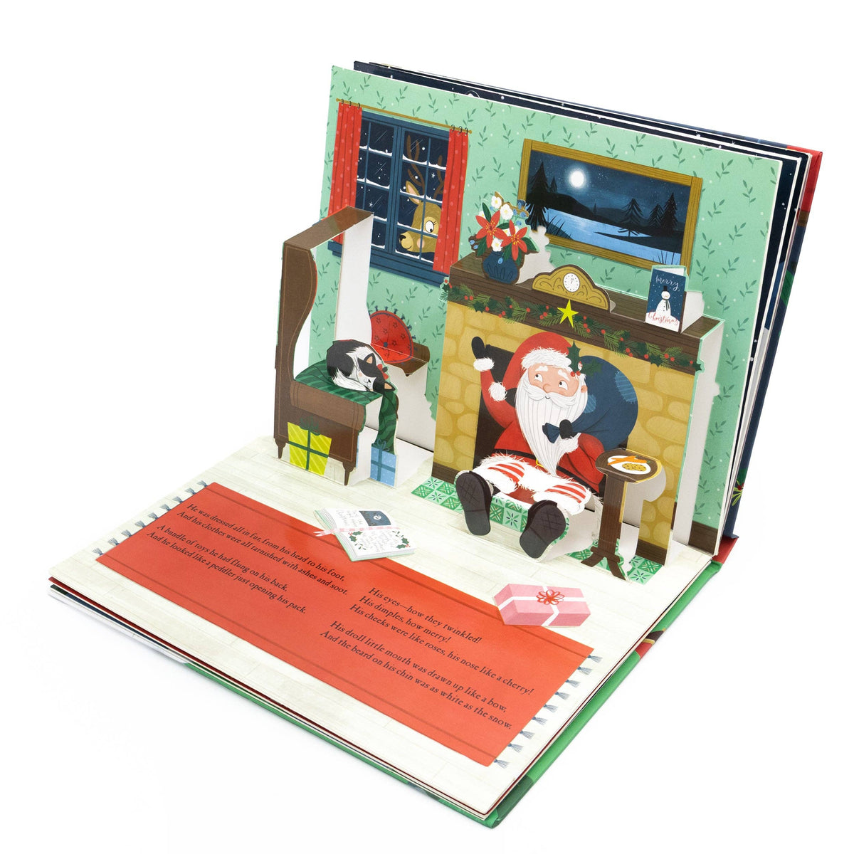 The Night Before Christmas pop-up book opened to show its colourful three-dimensional Christmas scenes