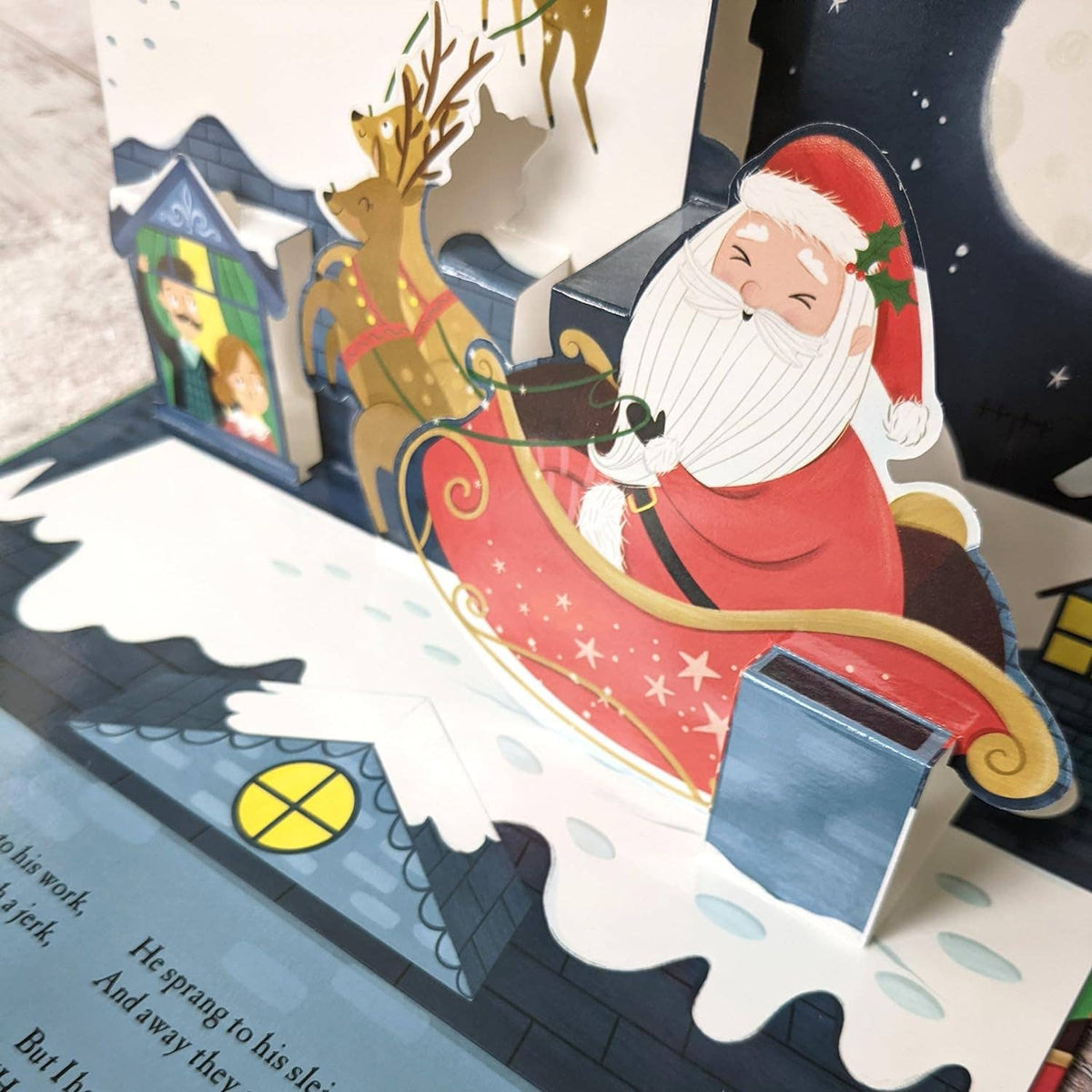 The Night Before Christmas pop-up book featuring Father Christmas and his sleigh