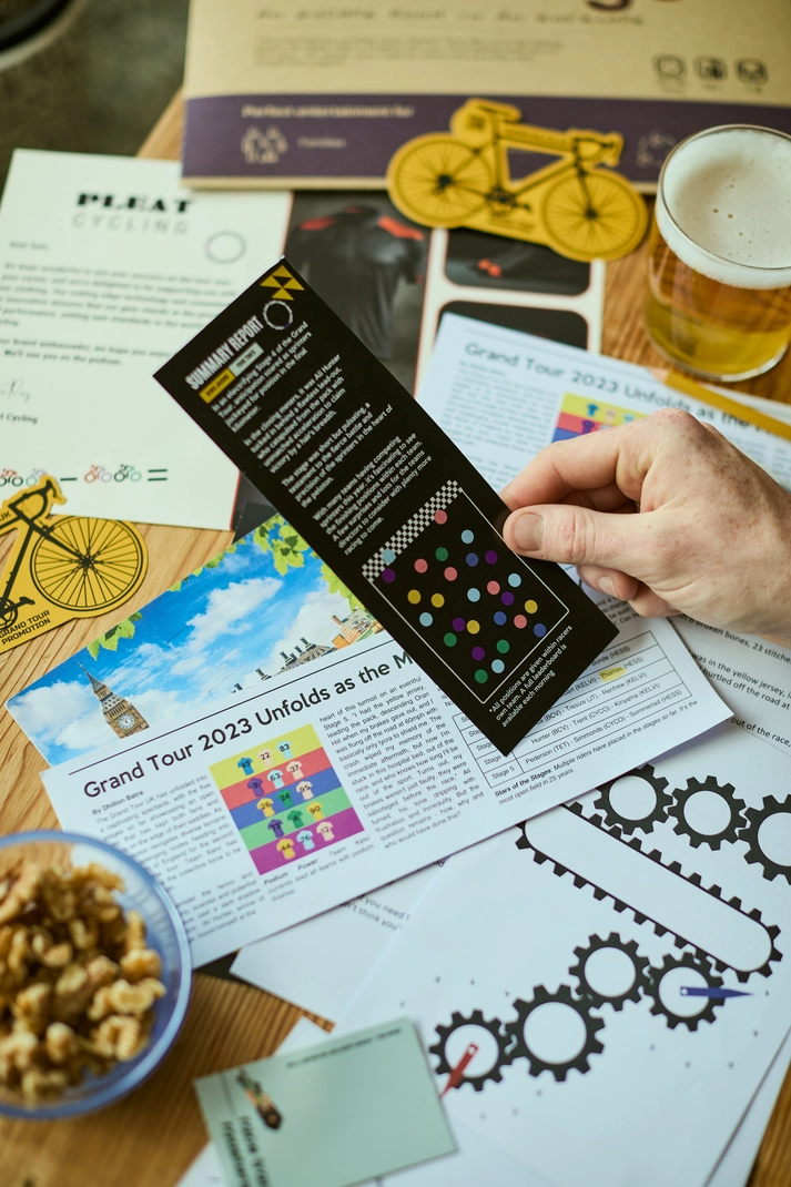 The Sabotage escape room game being played with cycling-themed puzzles and interactive online finale