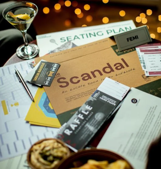 The Scandal escape room puzzle game contents with tennis-themed clues and documents