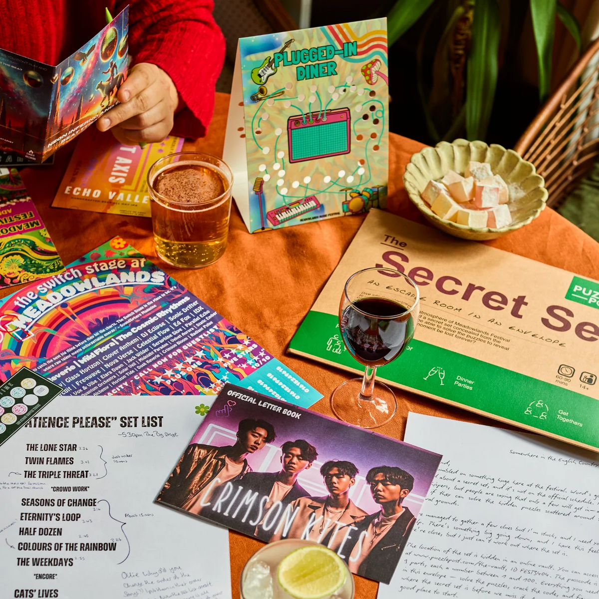 The Secret Set escape room puzzle game contents with festival-themed clues and documents