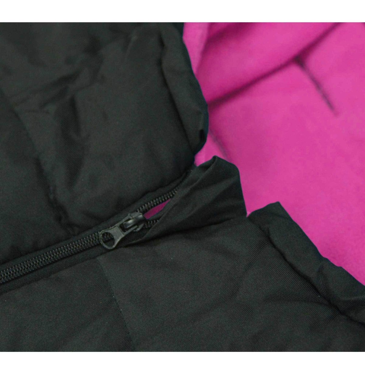 Close-up of a black footmuff with a zipper, showing a pink interior.