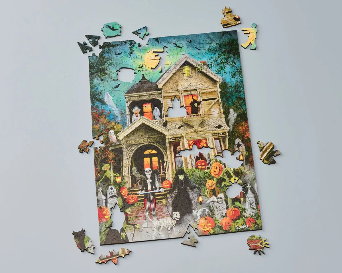 Wentworth An Eerie Welcome wooden Halloween puzzle partly completed with irregular pieces and themed whimsies