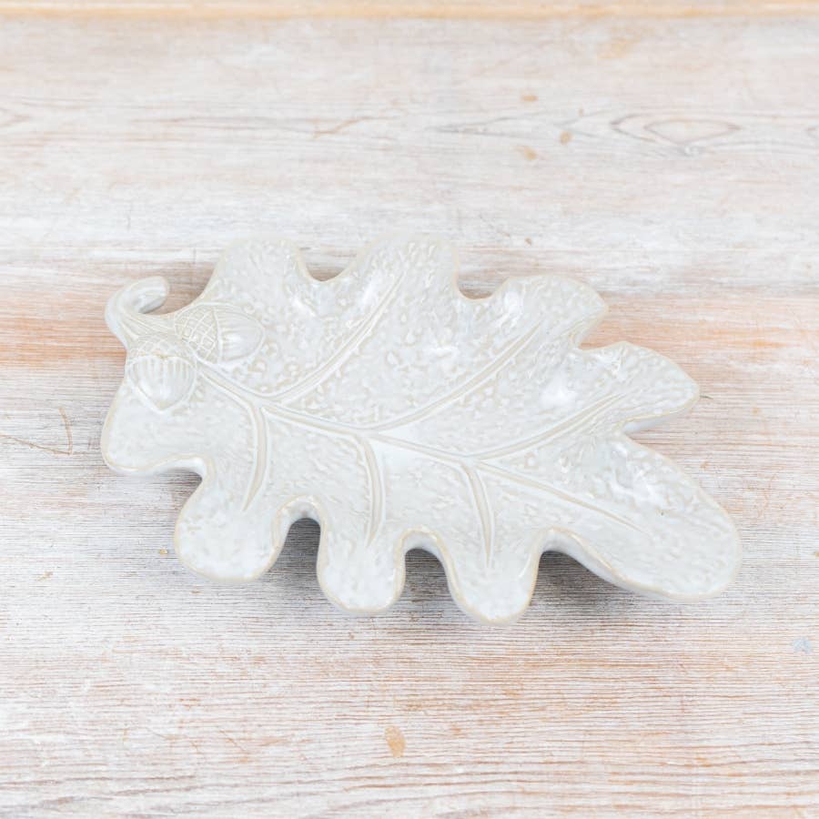 White porcelain leaf-shaped trinket dish showing its sculpted textured design