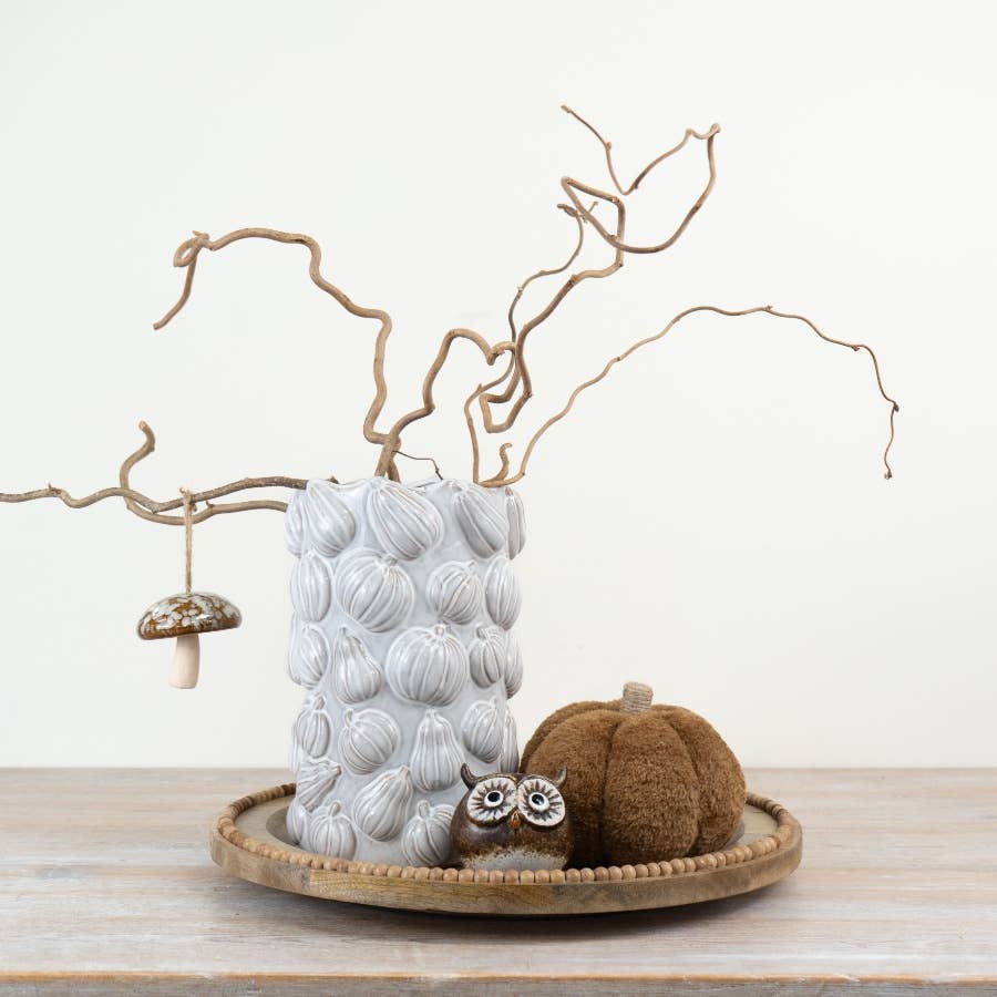 White textured pumpkin ceramic vase styled in a warm country home interior