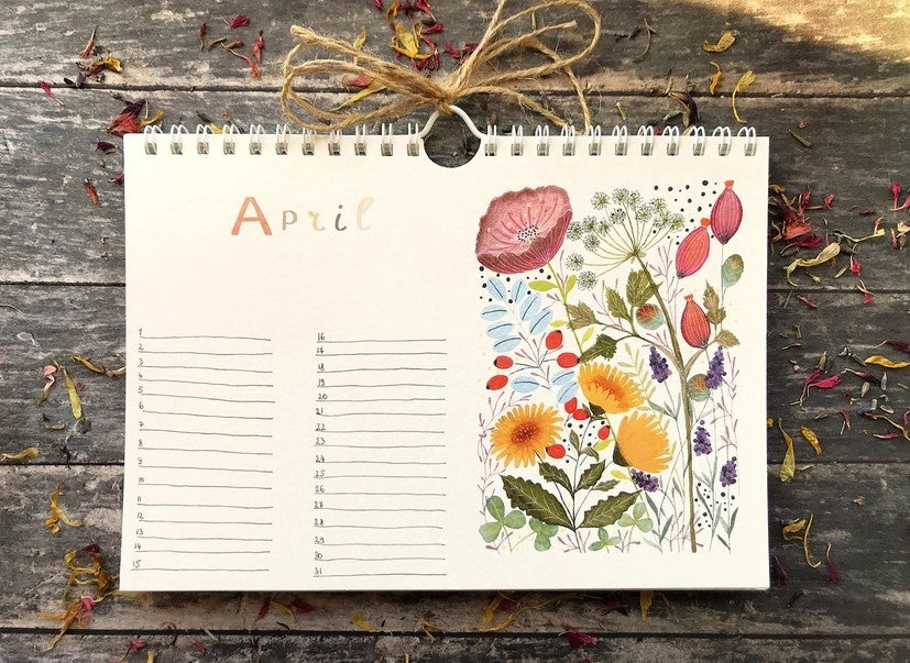 Wildflower Perpetual Calendar April page featuring poppies and delicate wildflower illustrations