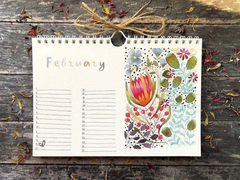 Wildflower Perpetual Calendar February page featuring colourful botanical artwork with a pink protea flower and delicate foliage