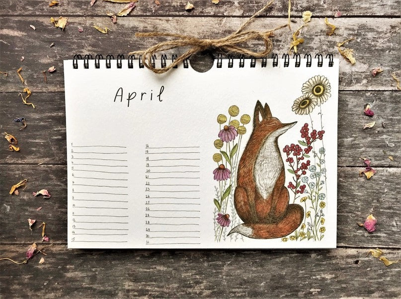Wildlife & Botanical Perpetual Calendar April page featuring a seated fox surrounded by colourful wildflowers