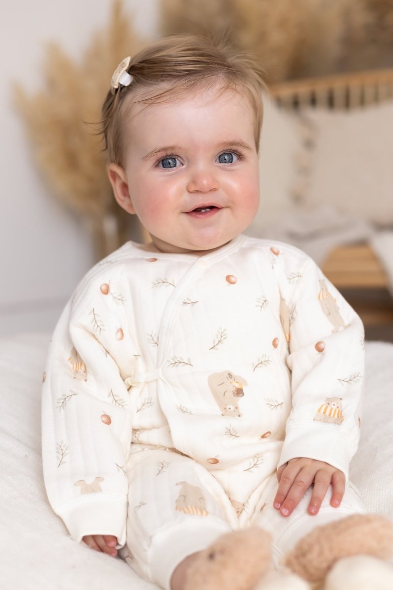 Baby wearing the soft 100% cotton Woodland Bear Baby Grow Romper