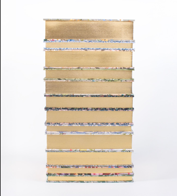Stack of Wordsworth Heritage Collection hardbacks showing their metallic gold-gilded page edges